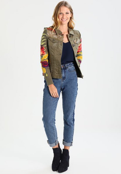 green embroidered denim jacket with high-cuffed jeans