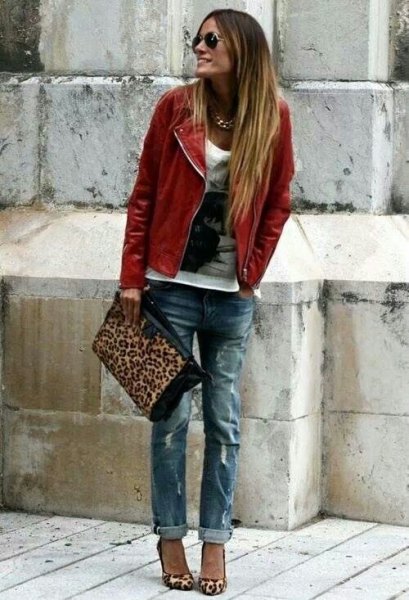 brown leather coat with white print on boyfriend jeans