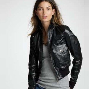 black leather jacket with gray western blue jeans
