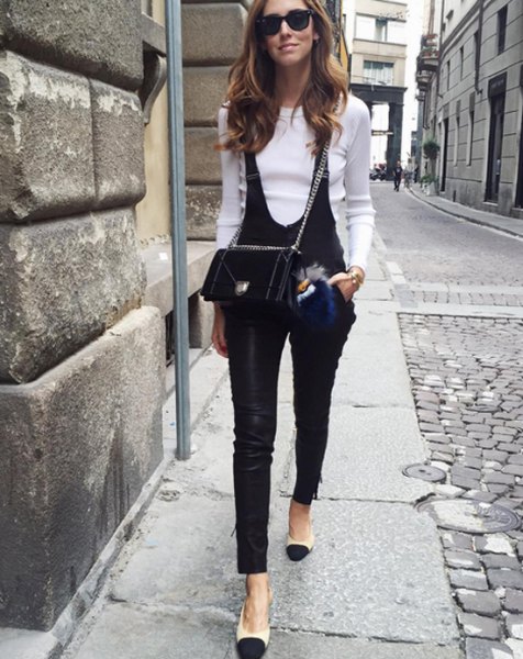 white sweater with suede with black leather overalls