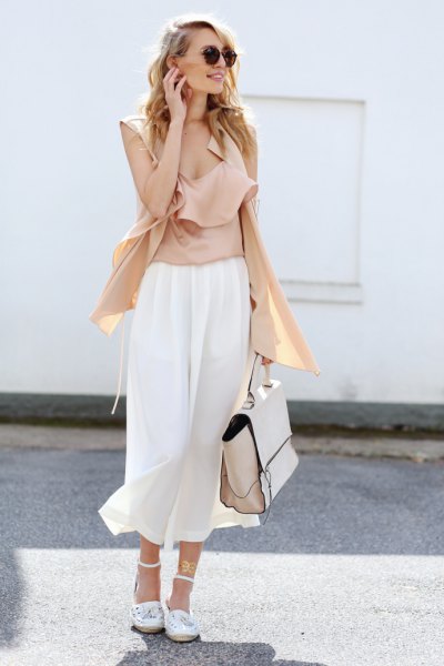 pink sleeves without sleeveless blouse with white culottes