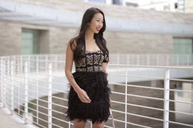 black sweetheart neckline feather mini dress with silver sequin details