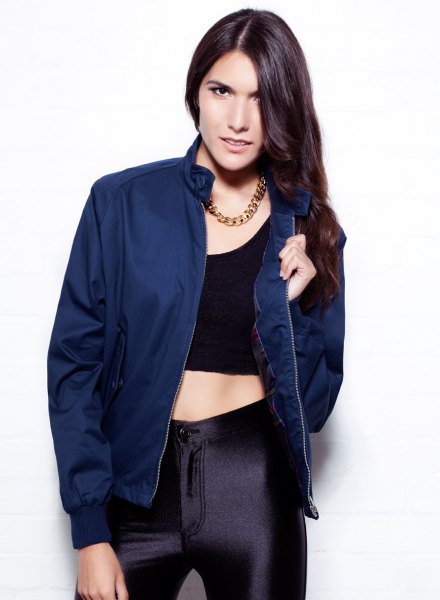 navy jacket with black crop top and silk hair pants