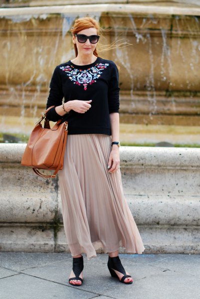 black and silver sweater with light pink pleated maxi skirt
