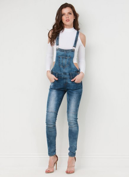 white cropped cold shoulder sweater with blue denim skinny overall