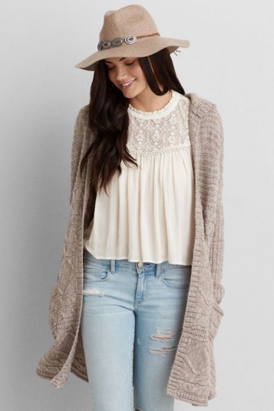 straw floopy hat with white lace blouse gray long hood cardigan