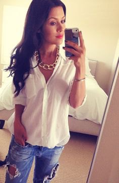 white button up linen shirt with ripped boyfriend jeans and gold chain necklace