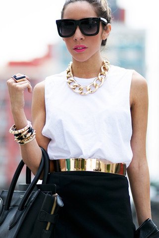 gold belt white sleeveless top black mini skirt