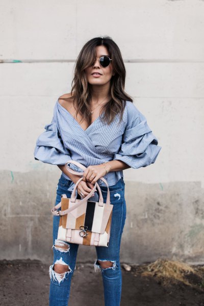 of shoulder blue and white striped wrap shirt