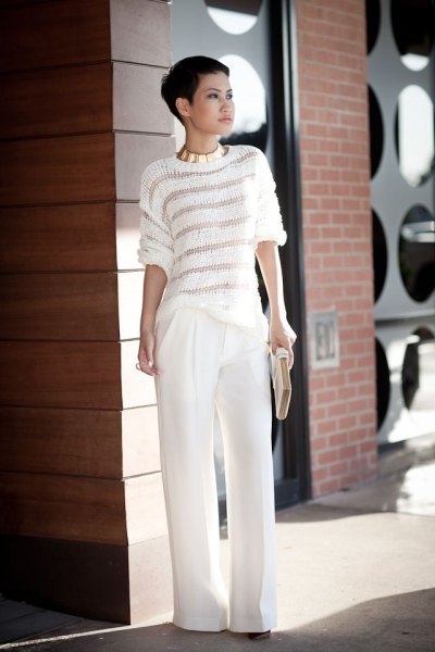 white and gray striped sweater and wide leg trousers