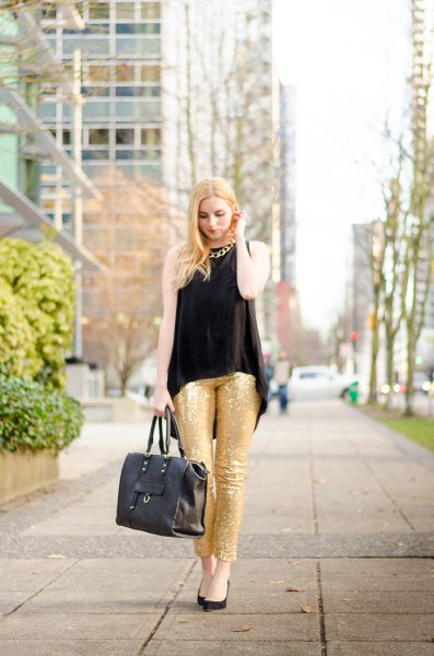 black sleeveless blouse gold sequin necklaces