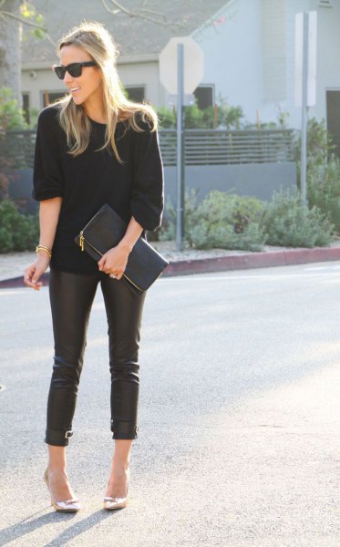 black knit sweater with leather pants white high heeled loafers