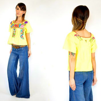 yellow mexican farmer blouse blue puffed jeans