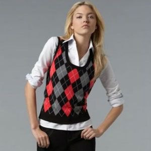 red gray black patterned sweater vest white shirt jeans