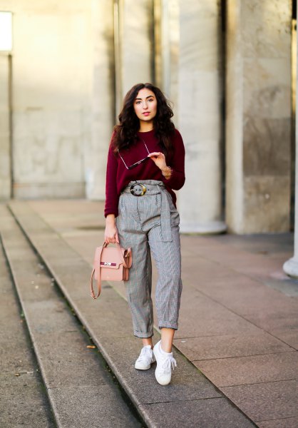 dark green sweater with high height cuffed plaid trousers