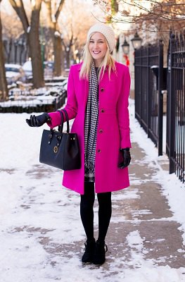 neon pink long wool coat black sweater plaid mini skirt