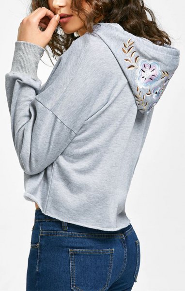 gray floral embroidered hoodies blue skinny jeans