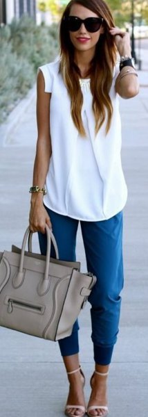 white sleeveless blouse blue cropped jogging belly