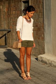 green khaki shorts white fitted sweater