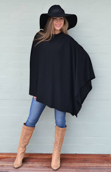 black wool poncho floppy hat leather boots