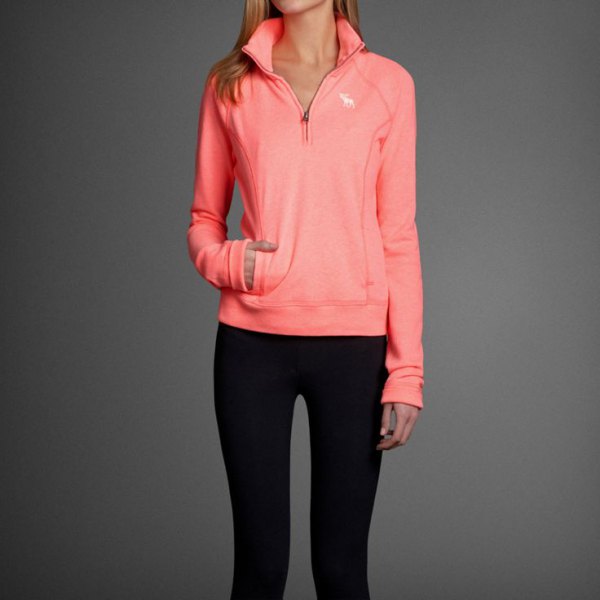 neon pink pullover black skinny jeans