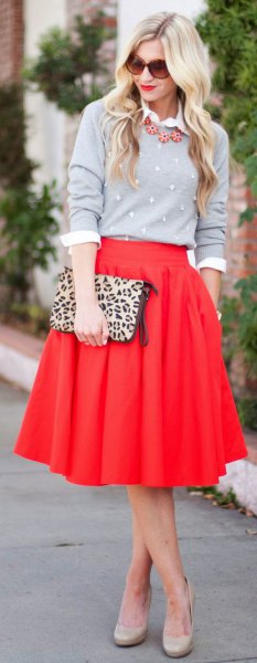 red skirt gray shirt cheetah bag