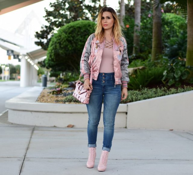 pink bomber jacket jeans boots