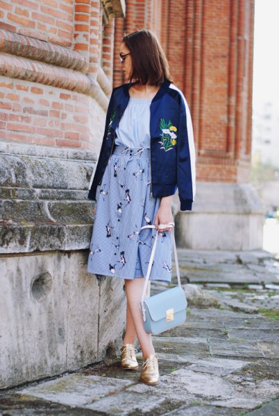 navy blue embroidered jacket with high waist flare skirt