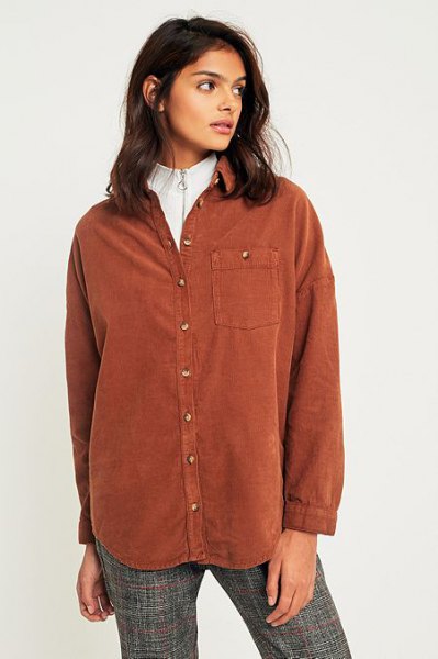 brown shirt over white sweater with hair loss