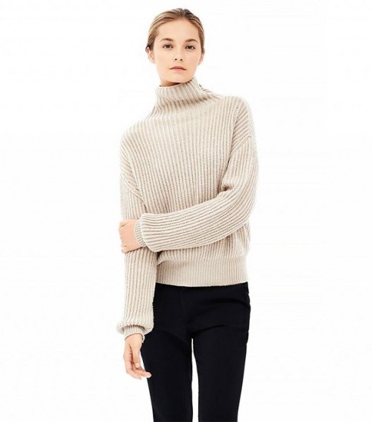 beige mock neck with ribbed sweater black skinny jeans