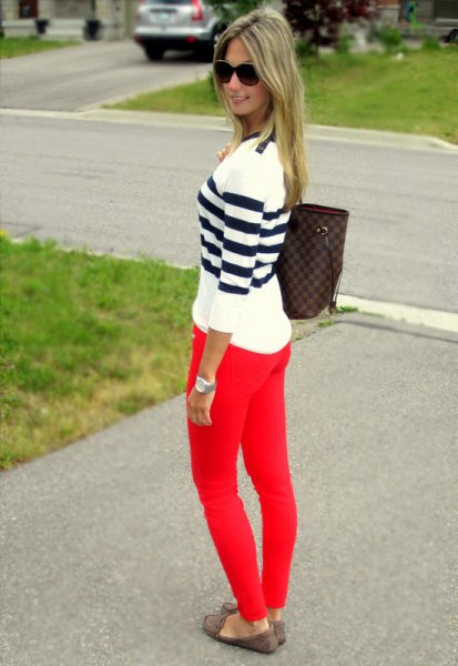 black and white striped sweater red skinny jeans