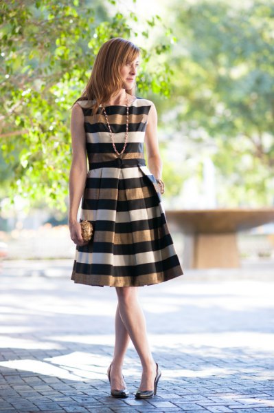 gold black white striped sleeveless flare dress