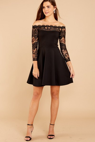 black lace in a long sleeve fit and flare dress