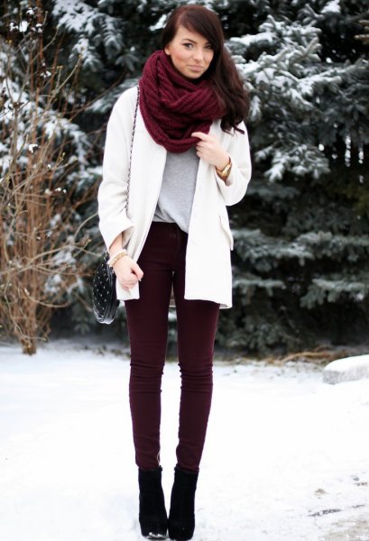brown scarf white wool coat black corduroy pants