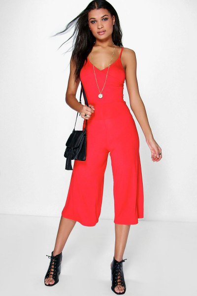 red deep v-neck jumpsuit open toe boots