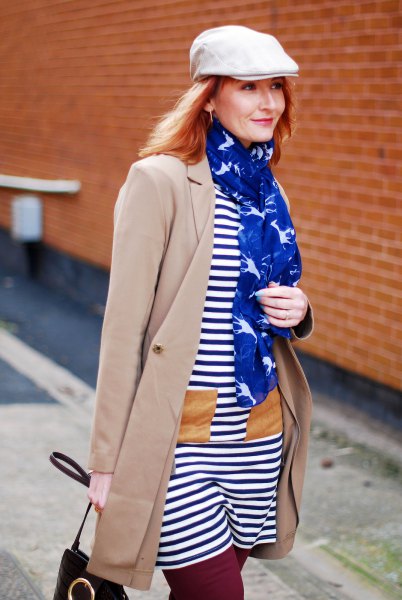 white flat hat with navy blue and white striped t-shirt dress