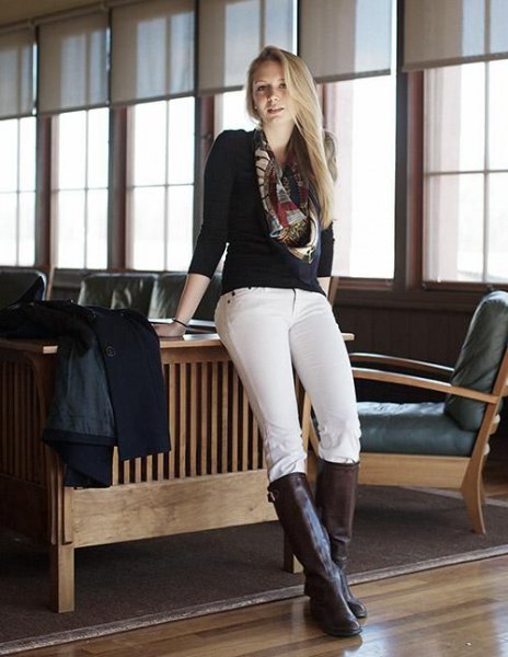 black sweater white riding breeches knee high boots