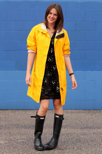 yellow raincoat black lace dress rain boots