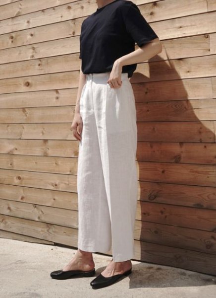 white black top with high waist in linen trousers