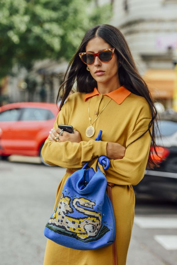yellow blue outfit blue bag