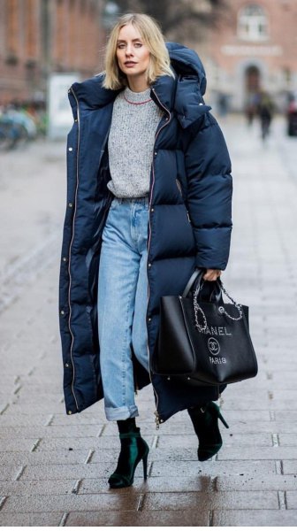black long puffer skirt with gray sweater and mom jeans