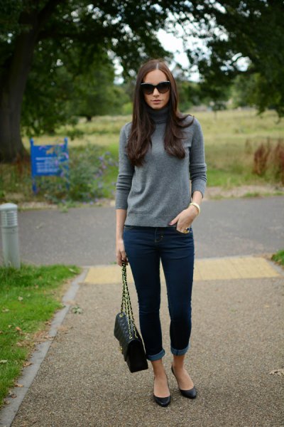 gray suede cashmere sweater with dark blue cuffed skinny jeans