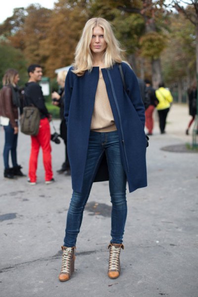 navy blue wool long jacket with pink sweater and super skinny jeans