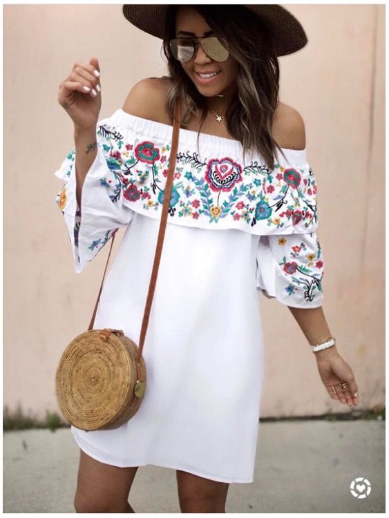 white embroidered dress outside the shoulder