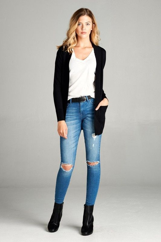 The black cardigan is a closet staple. I love this one because .