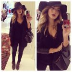 Sophisticated all-black outfit with an adorable black floppy hat .