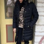 Winter outfit ideas black long puffer jacket fur hood Michael Kors .