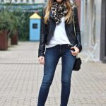 skinny jeans with ankle boots - great scarf and leather jacket .