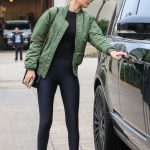 Gigi Hadid Green Jacket over total black sport outfit | Sporty .