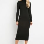 A midi-length turtleneck dress with long sleeves. Must be part of .